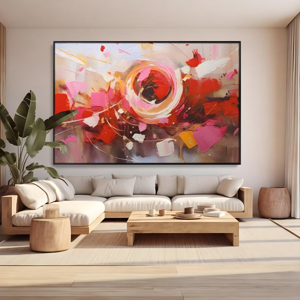 Tablou canvas cu tablou canvas cu floare abstracta si culori vibrante, in rama de aluminiu negru, pe perete intr-un living